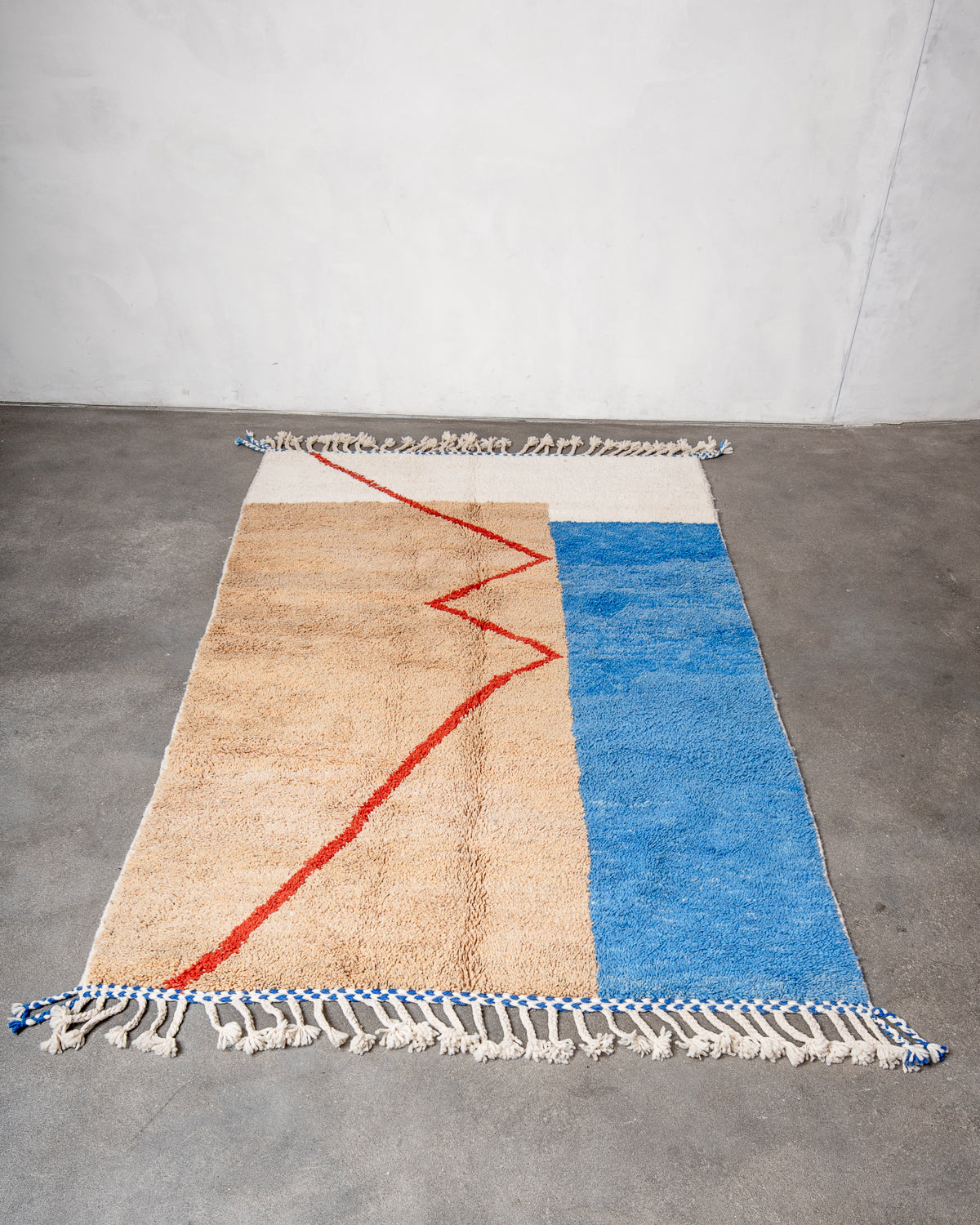 Modern, designer, handcrafted Berber rug from Morocco. Beniourain carpet with beautiful colours and patterns and fluffy wool texture.